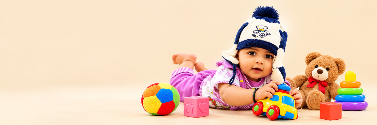 Baby with colourful toys